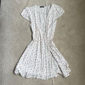 Spring wrap dress in white with red and pink rose print